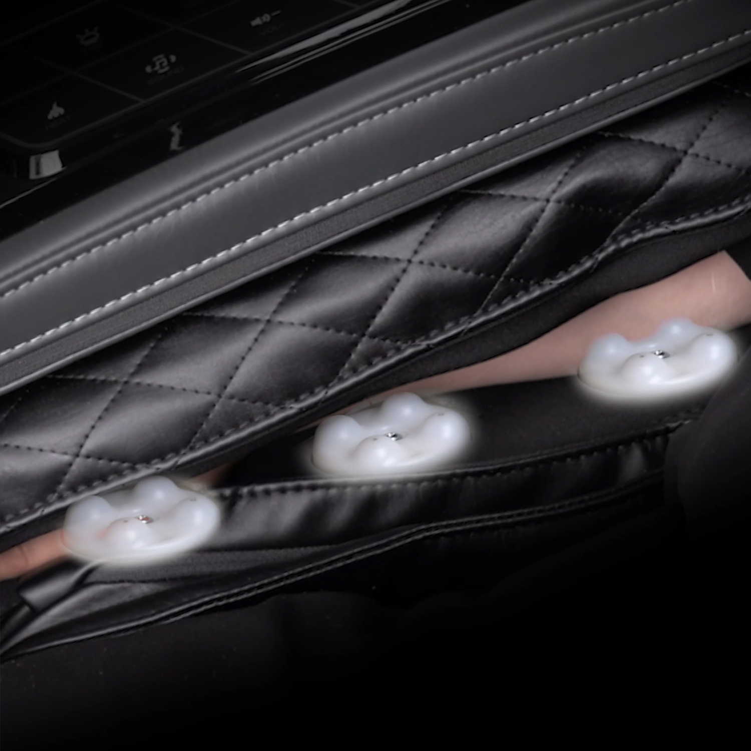 Osaki Trion Flex Duo 3 active arm rollers per side shown in armrest