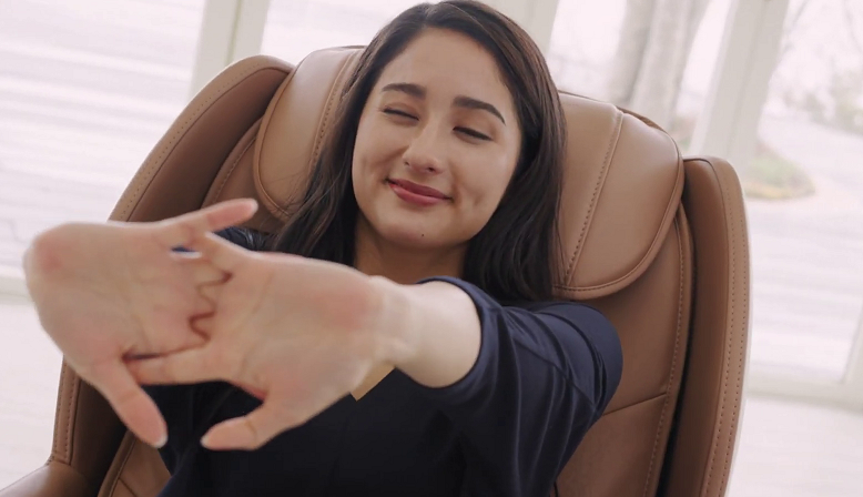 Enjoying mental relaxation in a massage chair